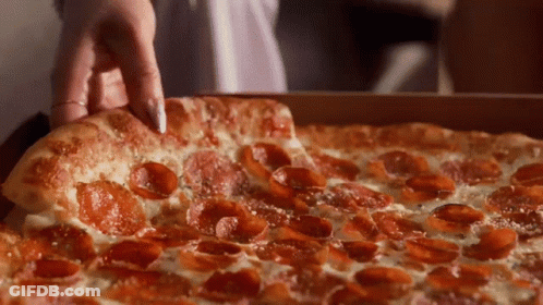 A Pepperoni Pizza With Cheese And Pepperoni Slices GIF