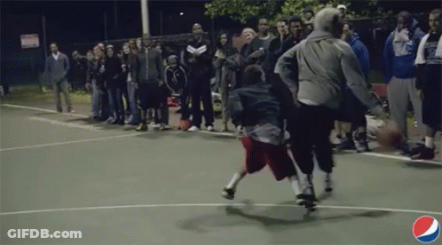 A Pepsi Logo Can Be Seen In The Corner Of This Basketball Court GIF