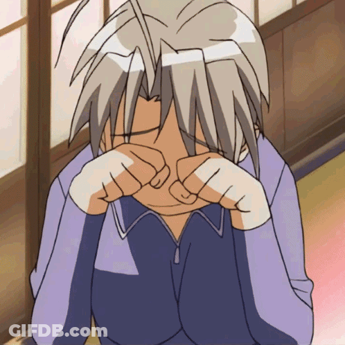 A Person Covering Their Face With Their Hands GIF