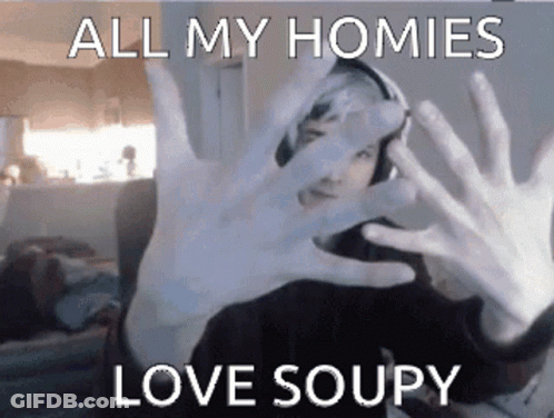 A Person Covering Their Face With Their Hands With The Words All My Homies Love Soupy GIF