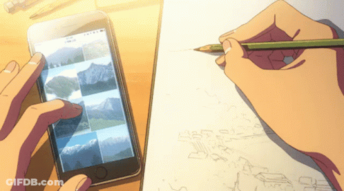 A Person Drawing On A Piece Of Paper While Looking At A Cell Phone GIF