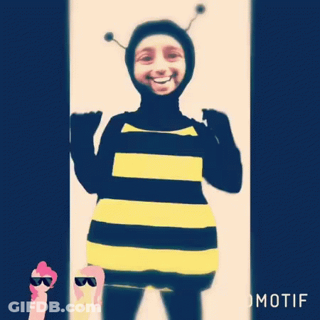 A Person Dressed In A Bee Costume With Motif Written On The Bottom Right GIF