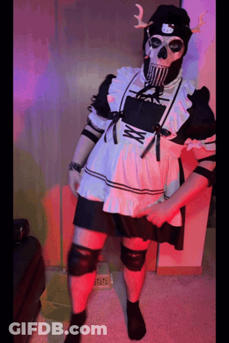 A Person Dressed In A Maid Outfit With A Hello Kitty Hat GIF