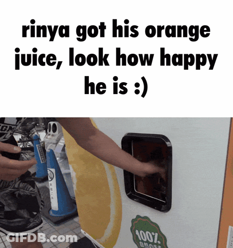 A Person Getting An Orange Juice From A Machine That Says 100 % On It GIF