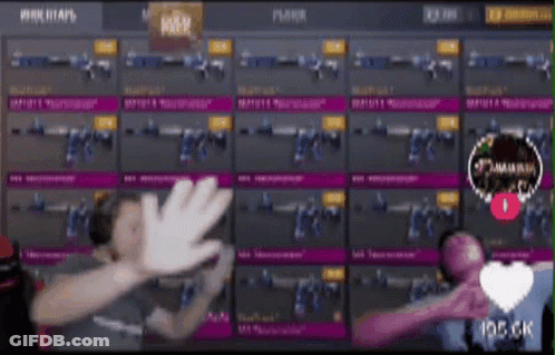 A Person Giving A High Five In Front Of A Display Of Weapons GIF