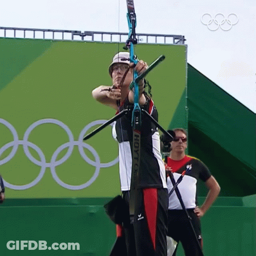Person Holding Bow And Arrow With Hoyts GIF