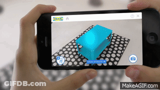 A Person Holding A Cell Phone With A 3D Model Of A Table On The Screen GIF