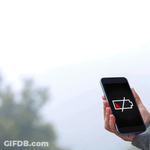 A Person Holding A Cell Phone With A Low Battery Icon On The Screen GIF