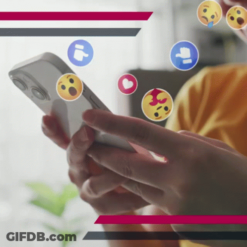 A Person Holding A Cell Phone With Emojis Floating Around GIF