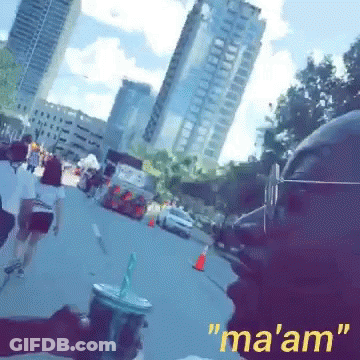 A Person Holding A Cup With A Straw And The Words " Ma 'Am " On The Bottom Right GIF
