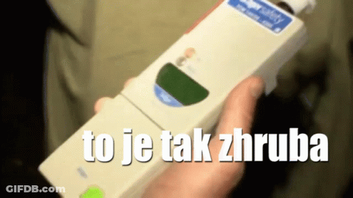 A Person Holding A Device That Says To Je Tak Zhruba On It GIF