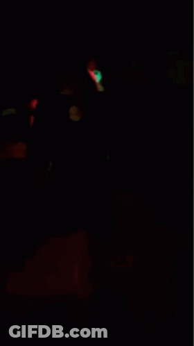 A Person Holding A Glowing Object In Their Hand GIF