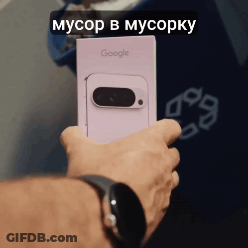 A Person Holding A Google Phone In Their Hand GIF