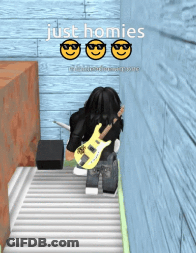 A Person Holding A Guitar In Front Of A Wall With The Words Just Homies GIF