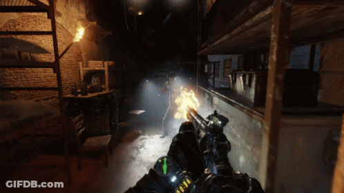 A Person Holding A Gun In A Dark Room With A Green Arrow Pointing To The Left GIF