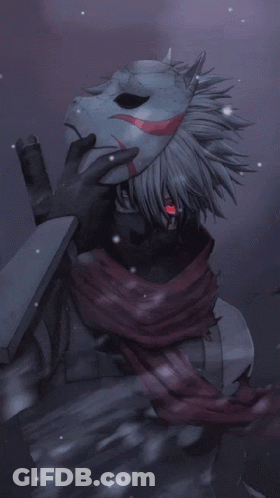A Person Holding A Mask With A Red Eye GIF
