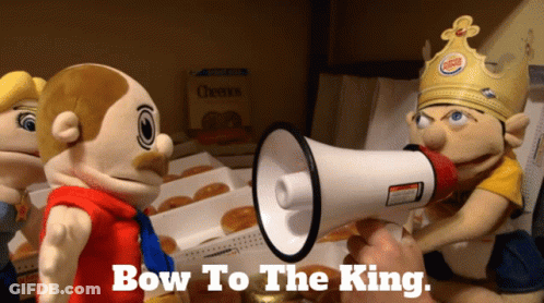 A Person Holding A Megaphone With Bow To The King Written On It GIF