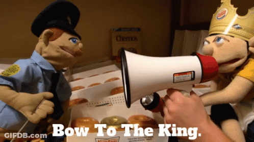 A Person Holding A Megaphone With The Words Bow To The King Written On It GIF