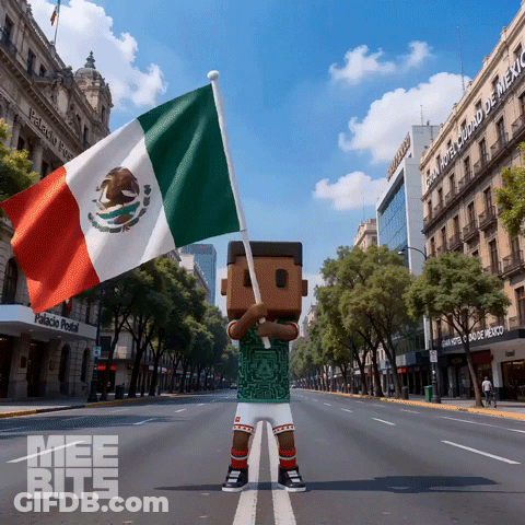 A Person Holding A Mexican Flag In Front Of A Palacio Postal Building GIF