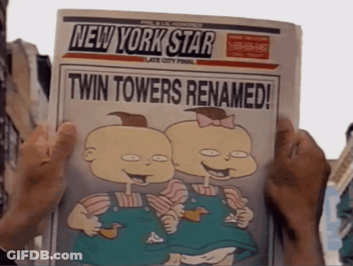 A Person Holding A Newspaper That Says New York Star GIF