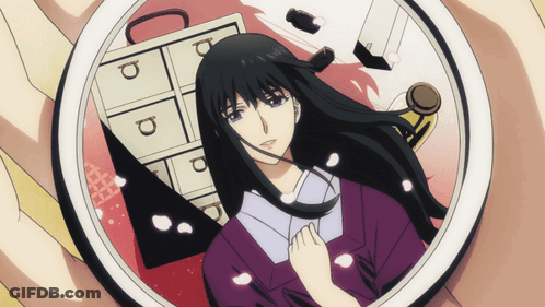 A Person Holding A Picture Of A Woman With The Letter P On The Drawers GIF