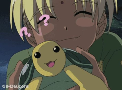A Person Holding A Stuffed Animal With A Question Mark On Their Head GIF