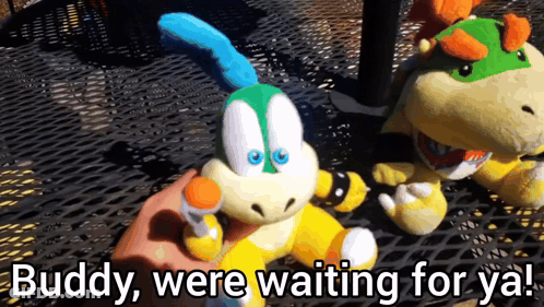 A Person Holding A Stuffed Animal With The Words " Buddy Were Waiting For Ya " Below It GIF