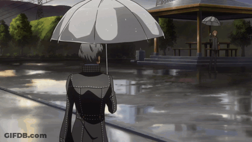 A Person Holding An Umbrella With A White J On It GIF