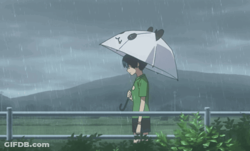 A Person Holding An Umbrella With The Number 2 On The Top GIF