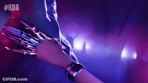 A Person Holding Another Person 'S Hand With #Kda On The Bottom Right GIF