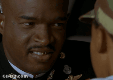 A Person Holding Another Person 'S Hand With The Words " Now You May Feel A Little Bit Of Pressure " Below Them GIF