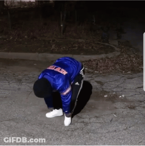 A Person In A Blue Jacket That Says Brooklyn On It GIF