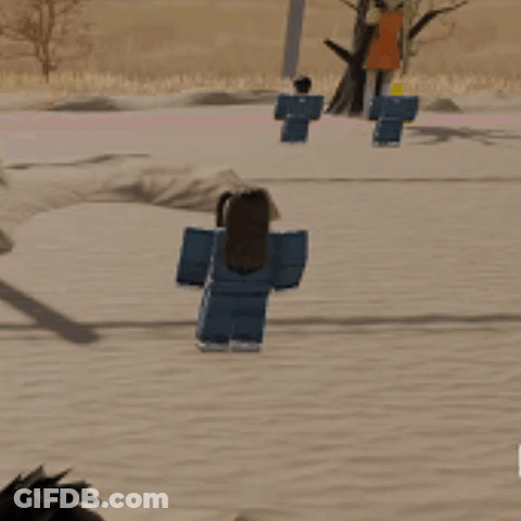 A Person In A Blue Outfit Is Walking In The Sand GIF