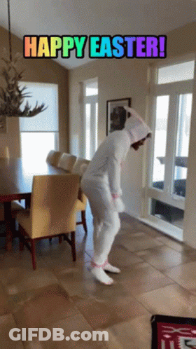 A Person In A Bunny Costume Is Dancing In A Living Room With The Words Happy Easter Written Above Them GIF
