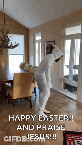 A Person In A Bunny Costume Is Dancing In A Room With The Words Happy Easter And Praise Jesus !!! GIF