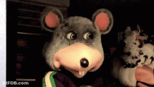 A Person In A Chuck E Cheese Mouse Costume GIF