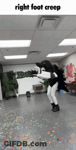 A Person In A Costume Is Dancing In A Room With Confetti And The Words Right Foot Creep On The Bottom GIF