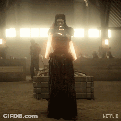 A Person In A Dark Room With A Netflix Logo On The Bottom Right GIF