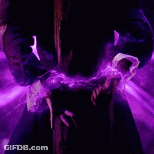 A Person In A Dark Room With Purple Lights Coming Out Of Their Hands GIF