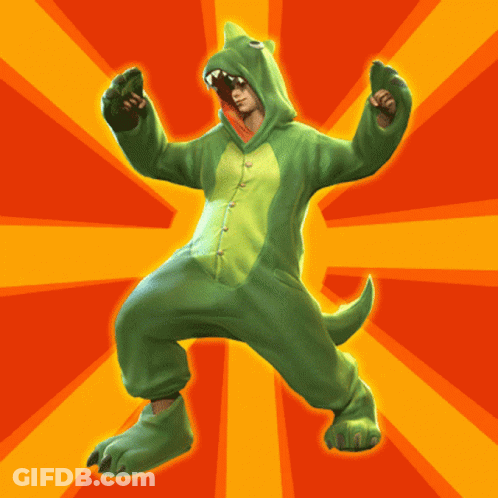 A Person In A Green Dinosaur Costume Is Standing In Front Of A Yellow And Orange Background GIF