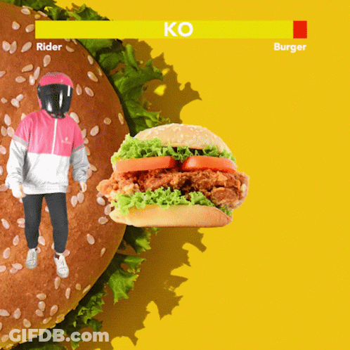 A Person In A Helmet Is Standing Next To A Large Hamburger That Says Rider GIF