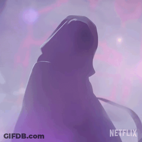A Person In A Hooded Cape With Netflix Written On The Bottom GIF