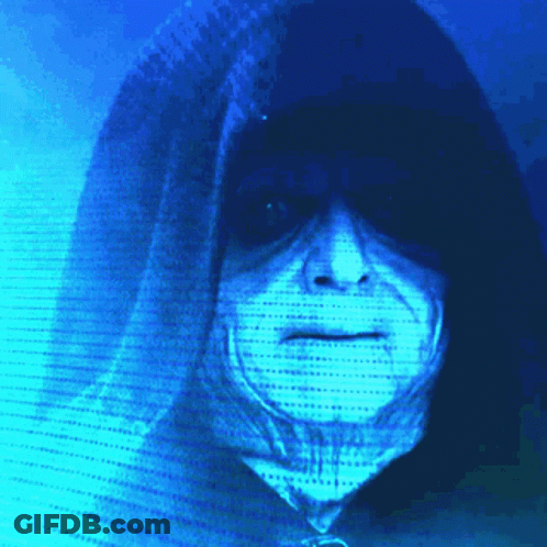 A Person In A Hooded Jacket With A Blue Background Behind Them GIF
