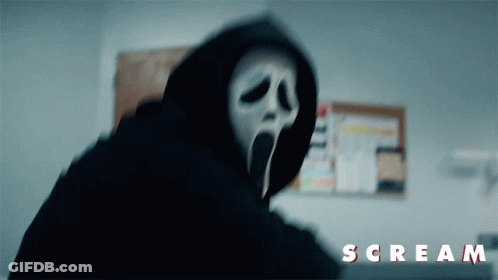 A Person In A Hooded Mask With The Word Scream On The Bottom Right GIF