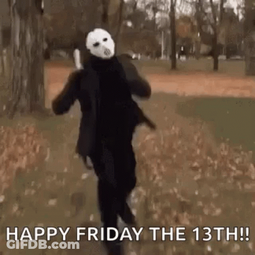 A Person In A Jason Voorhees Costume Is Running In A Park With A Knife . GIF