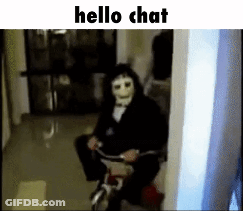 A Person In A Mask Is Riding A Bicycle In A Hallway . GIF
