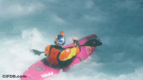 A Person In A Pink Kayak With The Word Koktail On The Side GIF