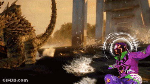 A Person In A Purple And Green Superhero Costume Is Fighting A Monster GIF
