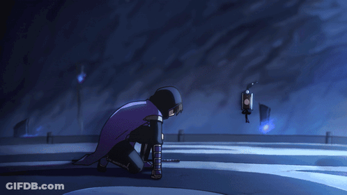 A Person In A Purple Cape Is Kneeling Down In A Dark Room GIF