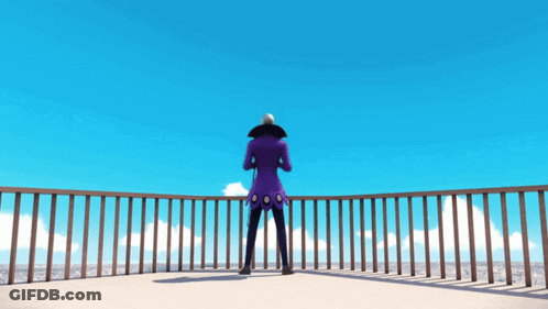 A Person In A Purple Coat Is Standing On A Balcony GIF